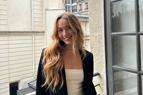 woman with long blonde hair smiling